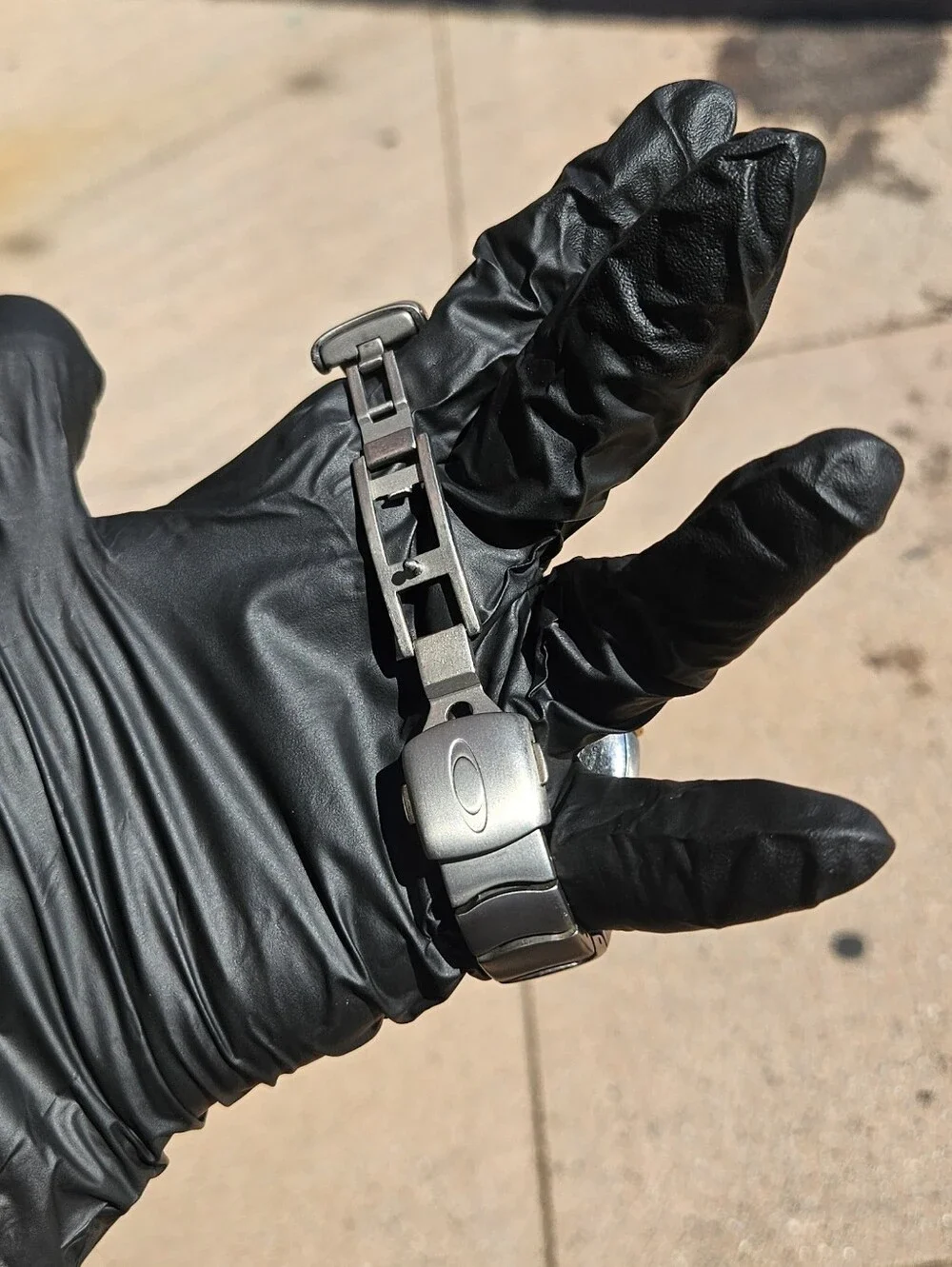 Oakley Timebomb Icon Titanium Watch with Gold Dial.